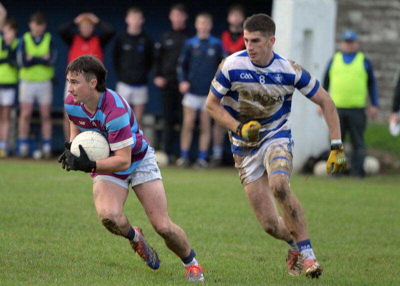 Ibane Gaels' Olan O'Donovan on the attack and away from James Murphy of Kinsale. Picture: Martin Walsh