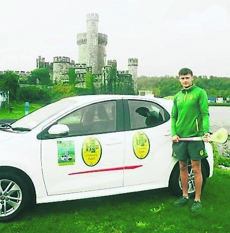 Alan Connolly with the Toyota Yaris that can be won in the fundraising draw.