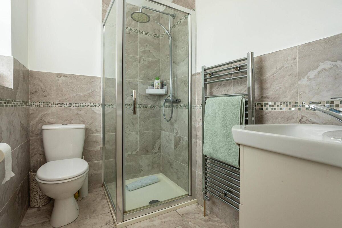 There are three bathrooms in the home. 