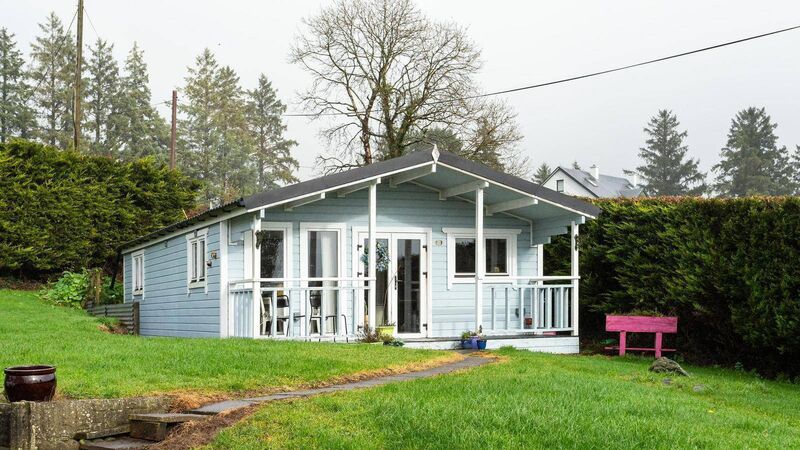 Cork home on the market with rare selling point - a cosy cabin on site