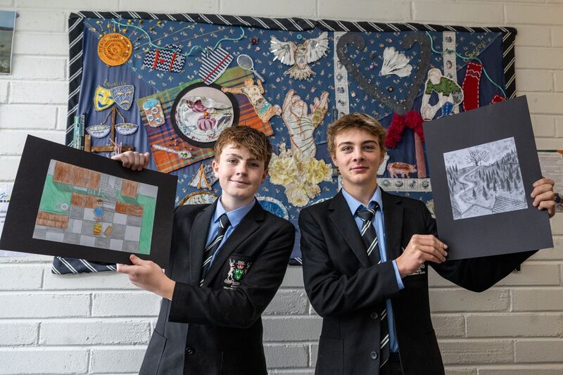 Ryan Farrell and Wolfie Tyndale, Bandon Grammar School students, pictured with their artwork for the fiction section of this year’s Holly Bough. Picture: Chani Anderson