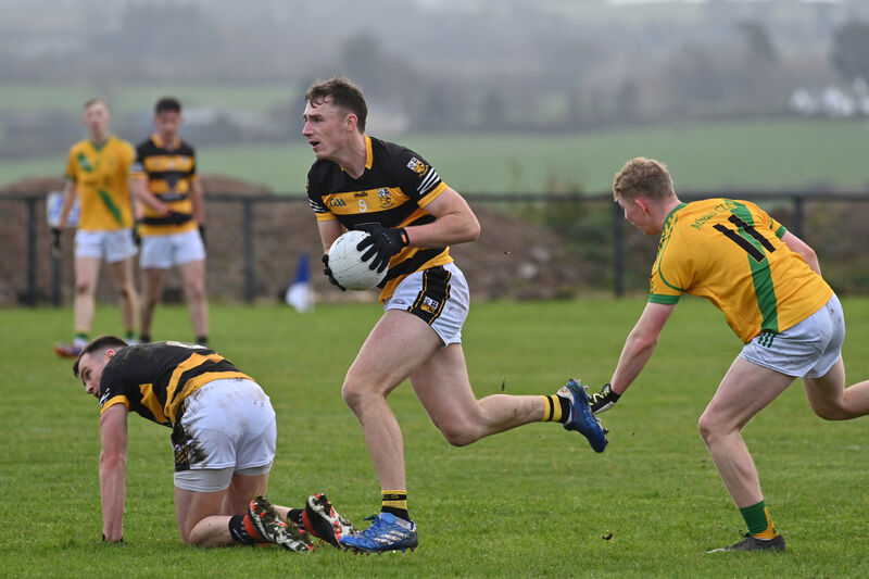 Kevin Lenahan, Buttevant, bursting past Liam Óg Glynn, Ahane. Picture: Dan Linehan Kevin Lenahan, Buttevant, bursting past Liam Óg Glynn, Ahane. Picture: Dan Linehan