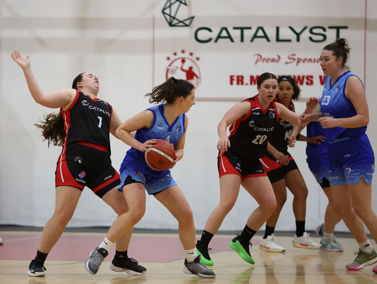 Amy Murphy, Fr. Mathews, cannot stop Aine McKenna, UCC Glanmire.   Women's Super League Basketball, Catalyst Fr. Mathews V's UCC Glanmire, at the Fr. Mathews Arena, Cork.