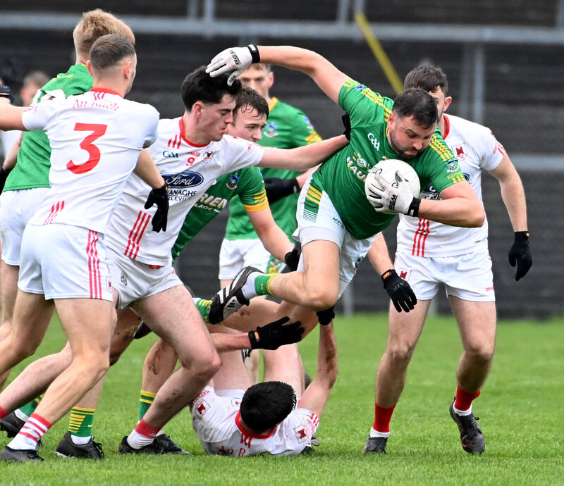 Kilmacabea's Daniel O'Donovan breaking past Charleville's Jack Buckley and Darren Casey. Picture: Eddie O'Hare