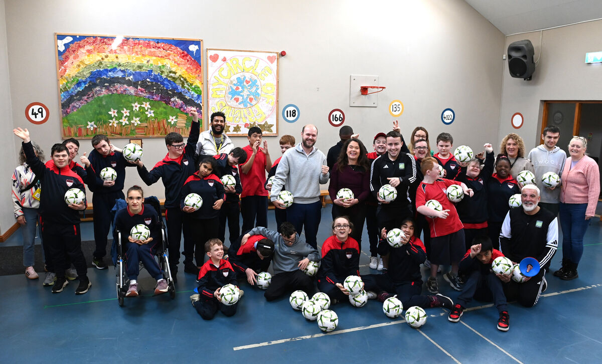  Smiling faces and fun times at the Coerver Coaching soccer sessions, sponsored by O'Keeffe's Bakery, Ballincollig at Our Lady of Good Counsel School, Ballincollig, Co Cork. Included are Coerver coaches Danny Bennet, and Luke Noonan, Stephen O'Keeffe of O'Keeffe's Bakery, Principal Aisling Power with staff and students. ECHO SPORT Picture: Larry Cummins