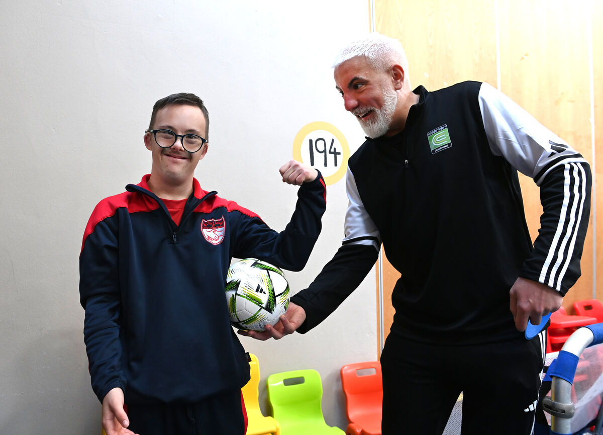 Pupil Tymon shows off his fitness and strength to coach Danny Bennett while enjoying the Coerver Coaching soccer sessions, sponsored by O'Keeffe's Bakery, Ballincollig at Our Lady of Good Counsel School, Ballincollig, Co Cork. ECHO SPORT Picture: Larry Cummins