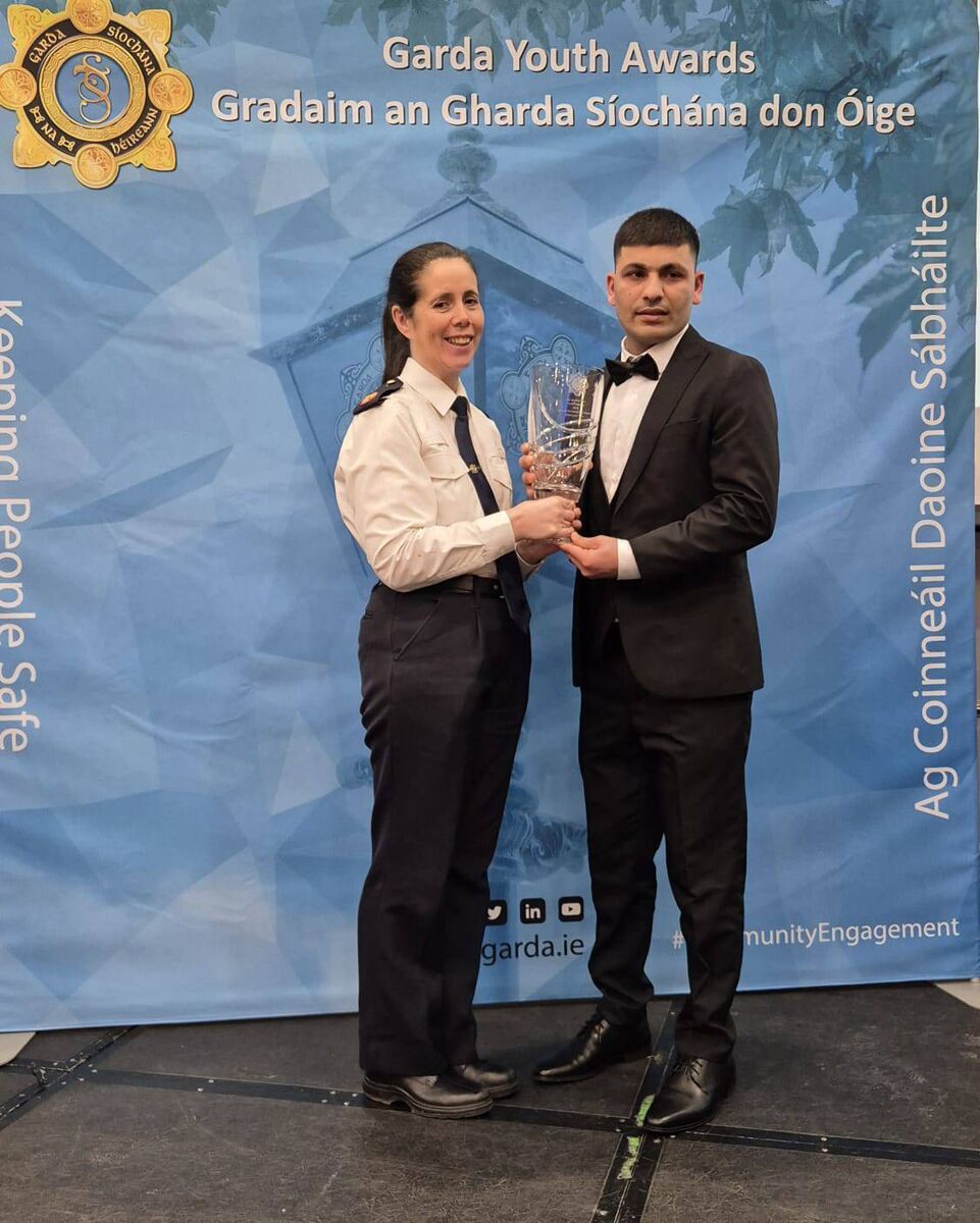 Assistant Garda Commissioner Catharina Gunne presenting Bakhtyar Nabi with a special achievement award at the National Garda Youth Awards. Picture: An Garda Síochána