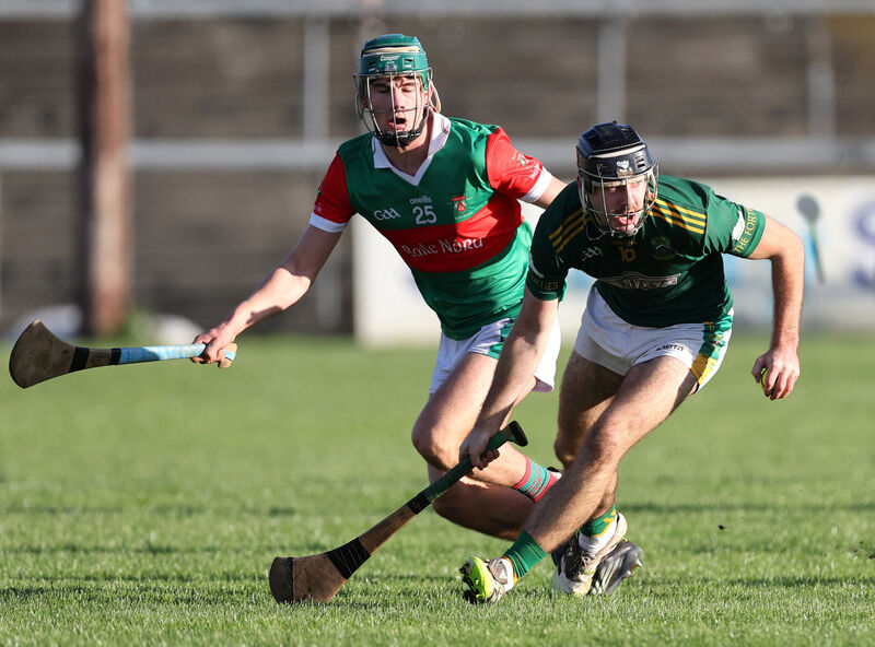  Jack Hegarty, Ballinora, in pursuit of Eoin Cullimore, Cobh. Picture: Jim Coughlan.