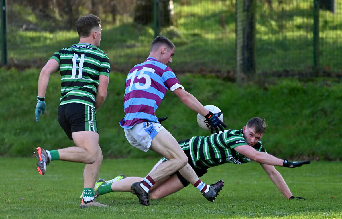  Douglas players Seán O'Leary and Harry Quilligan cannot stop Dara Walsh getting the opening goal for Ibane Gaels. Picture: Dan Linehan