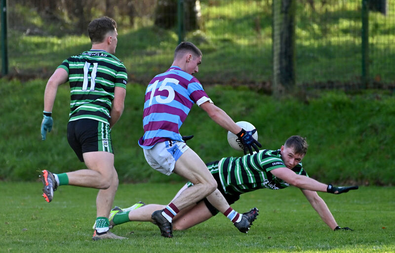  Douglas players Seán O'Leary and Harry Quilligan cannot stop Dara Walsh getting the opening goal for Ibane Gaels. Picture: Dan Linehan