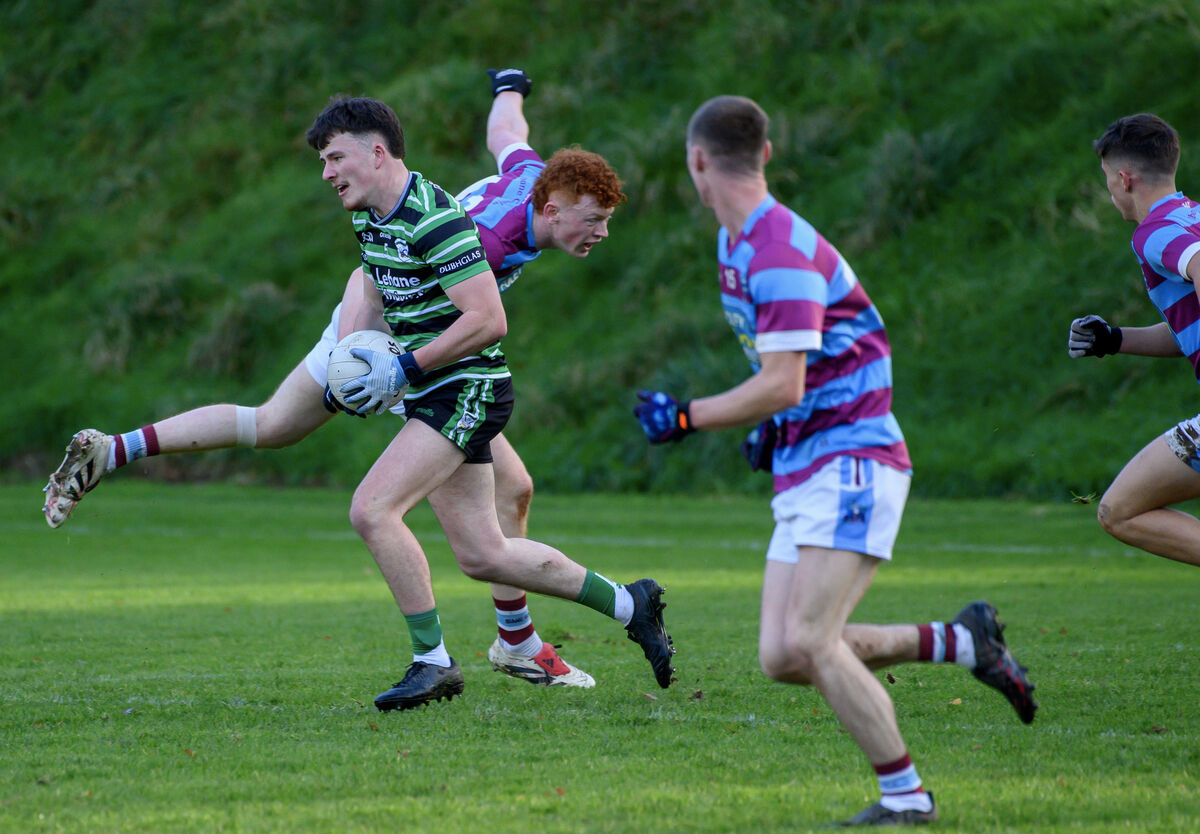  Colm Mac Pháidin of Douglas trying to get past Luke Murphy of Ibane Gaels. Picture: Dan Linehan