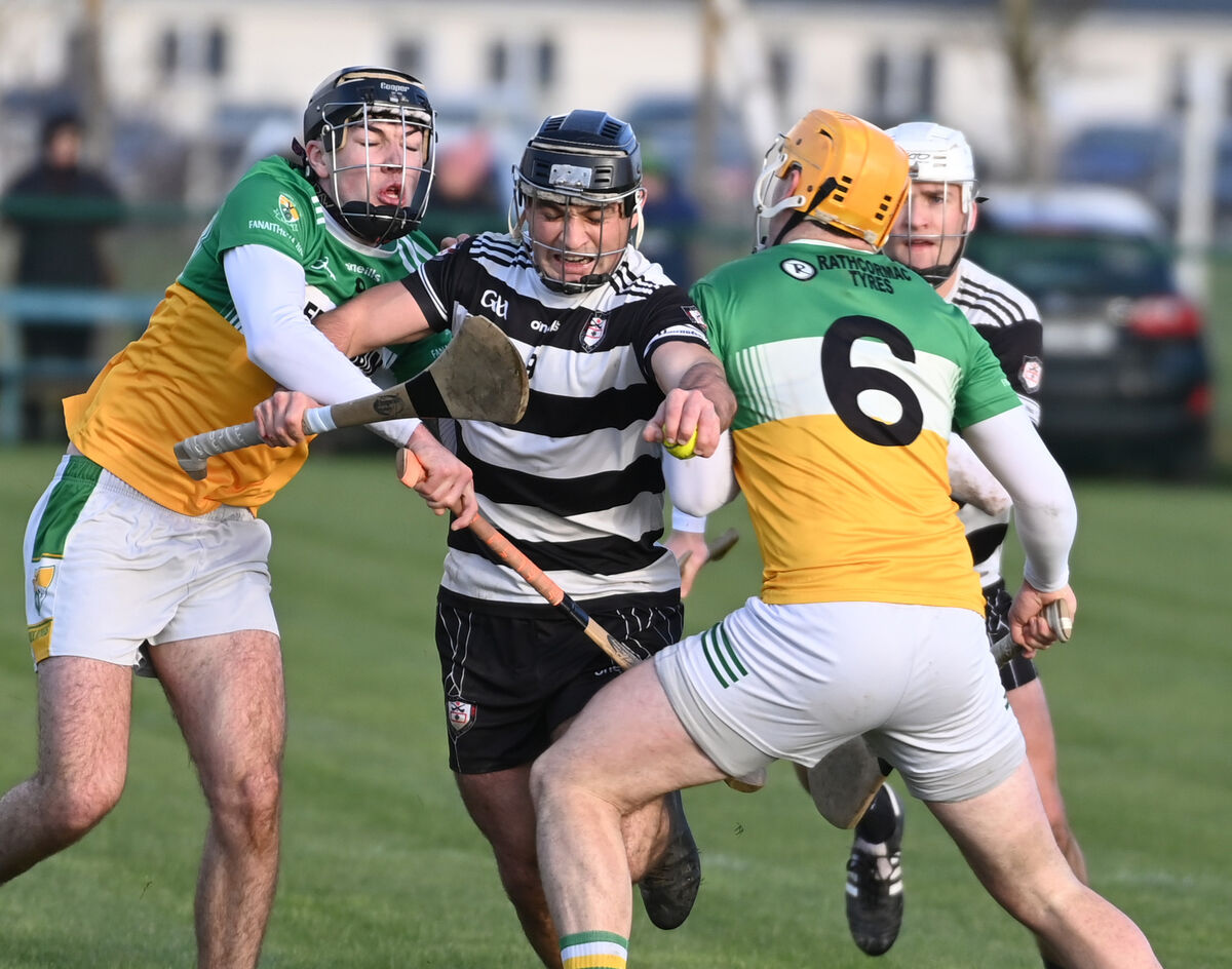  Midleton's Mikey Finn is tackled by Bride Rovers' Cormac O'Sullivan and Cillian Tobin. Picture: Eddie O'Hare