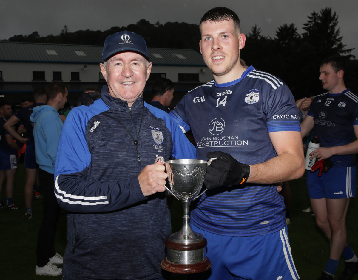 Knocknagree manager John Fintan Daly with captain Anthony O'Connor after winning the Division 2 league final against Carbery Rangers this season. Picture: David Creedon