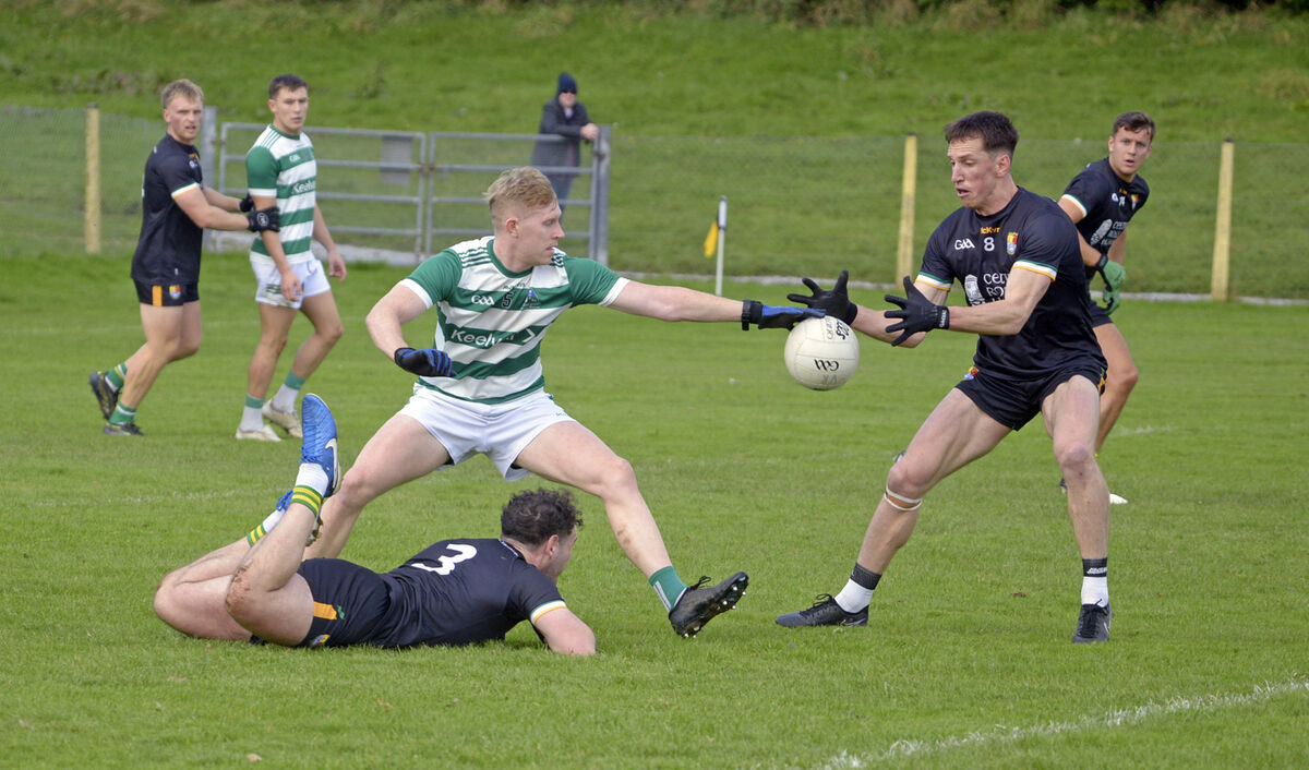 Valley Rovers' David Muckian and Carbery Rangers' Brian Hodnett fighting for possession. Picture: Denis Boyle