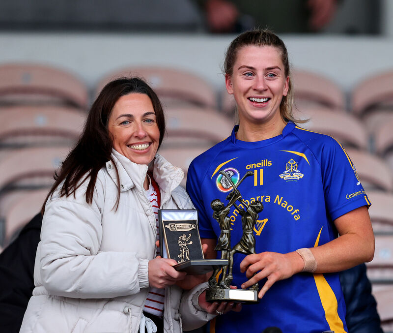Kate Wall is presented with the Player of the Match award. Picture: INPHO/Tom O'Hanlon Kate Wall is presented with the Player of the Match award. Picture: INPHO/Tom O'Hanlon