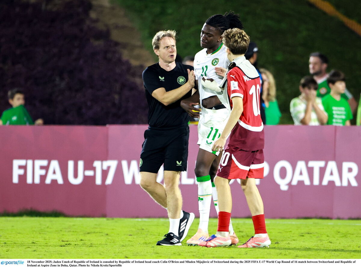 Jaden Umeh of Republic of Ireland is consoled by Republic of Ireland head coach Colin O'Brien and Mladen Mijajlovic of Switzerland during the 2025 FIFA U-17 World Cup Round of 16 match between Switzerland and Republic of Ireland at Aspire Zone in Doha, Qatar. Photo by Nikola Krstic/Sportsfile Jaden Umeh of Republic of Ireland is consoled by Republic of Ireland head coach Colin O'Brien and Mladen Mijajlovic of Switzerland during the 2025 FIFA U-17 World Cup Round of 16 match between Switzerland and Republic of Ireland at Aspire Zone in Doha, Qatar. Photo by Nikola Krstic/Sportsfile