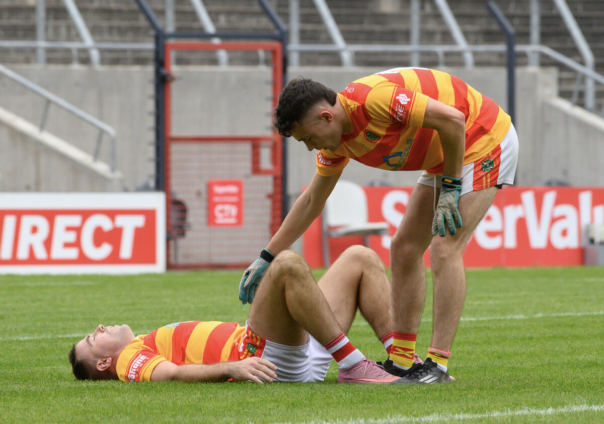 Jack Meade and Cormac O'Sullivan after their defeat to Nemo Rangers in the McCarthy Insurance Group Senior FC semi-final match at Páirc Uí Chaoimh. Picture: Dan Linehan