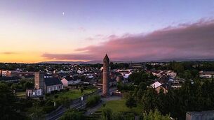Pre-sunrise sky and half moon over Clondalkin