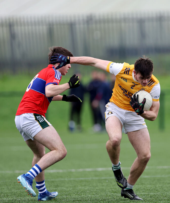  Hugo Woods, Hamilton High School, breaks away from Tadhg O'Sullivan, IS Killorglin. Picture: Jim Coughlan.