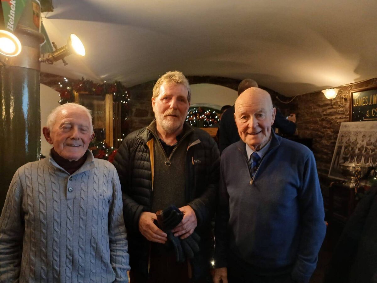 (From L-R) Pat Lougheed, team manager, Eugene Desmond, captain, and Gus Harrington coach.