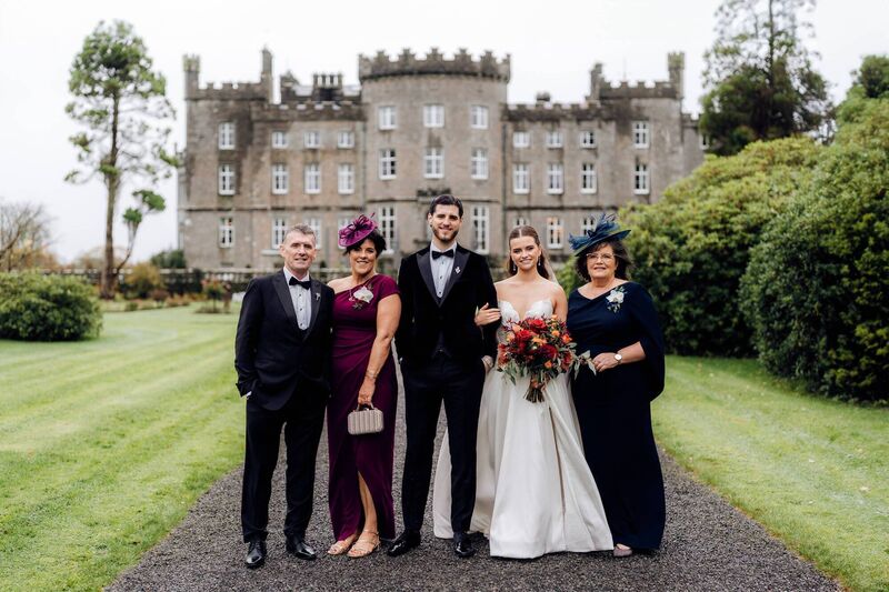 Cormac and Debbie Buckley, the bride and groom, Margaret Kelly. 