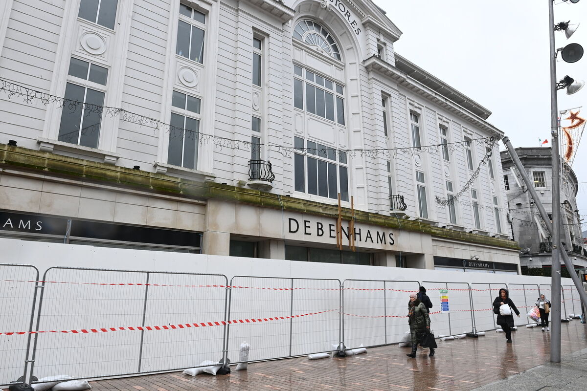 Wooden hoarding was erected at the front exterior of the former Debenhams/ Roches Stores building on St Patrick Street, Cork City. Pic: Larry Cummins 