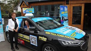 <p>Mary Frances Behan, Regional President of SVP South-West, pictured with campaign ambassador Francis Brennan launching the SVP Annual Car Draw 2025 as the charity reports a 20% rise in calls for help across the region.</p>