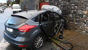 <p> The car whicih burst into flames after hitting a wall at Crab Lane. Picture: Larry Cummins.</p>