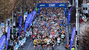 Participants in the The Dublin City Half Marathon make their way down O'Connell Street 30/3/2025