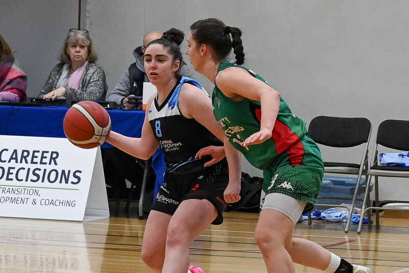  UCC Glanmire's Annaliese Murphy gets her pass away as Trinity Meteors' Franciska Treiliha closes in during their Women's Super League clash at the Mardyke Arena.