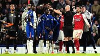 Ten-man Chelsea battle for a point against leaders Arsenal in fiery derby