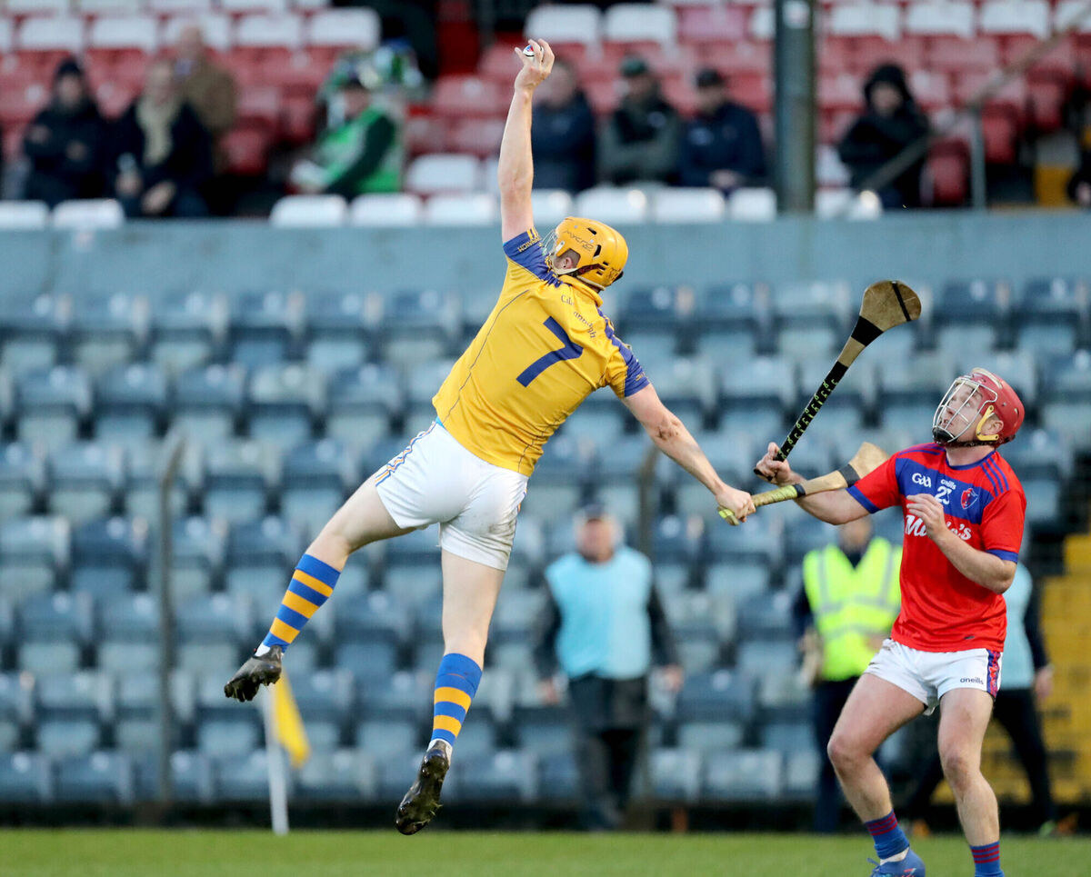  Kieran Twomey, Kilshannig, makes a catch ahead of Andrew Power, Erin's Own during the  2022 Cork Junior A Hurling Championship Final replay at Pairc Ui Rinn. Picture: Jim Coughlan.