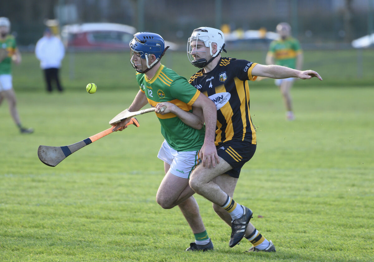  Eoin O'Neill, Kilbrittain, getting in a tackle on Jack Power, Kilrossanty, in the AIB Munster Club Junior Hurling Championship final at Mallow. Picture: Dan Linehan
