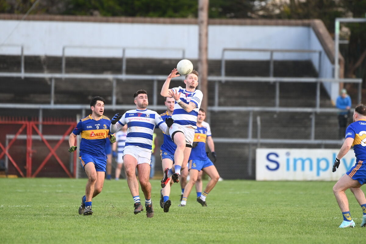  Eoin Hill battles for possession in the air for Ballyphehane against Carrigaline. Picture: Larry Cummins