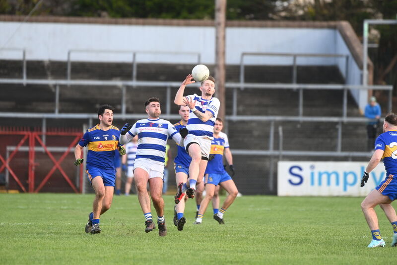  Eoin Hill battles for possession in the air for Ballyphehane against Carrigaline. Picture: Larry Cummins