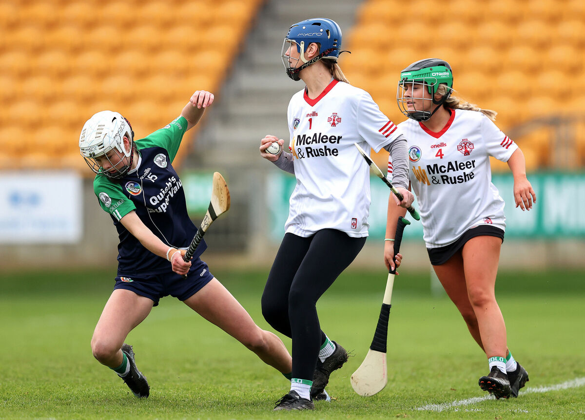 Ballincollig's Leah Hannigan challenges Eglish's keeper Brenda Horsfield. Picture: INPHO/Tom O'Hanlon