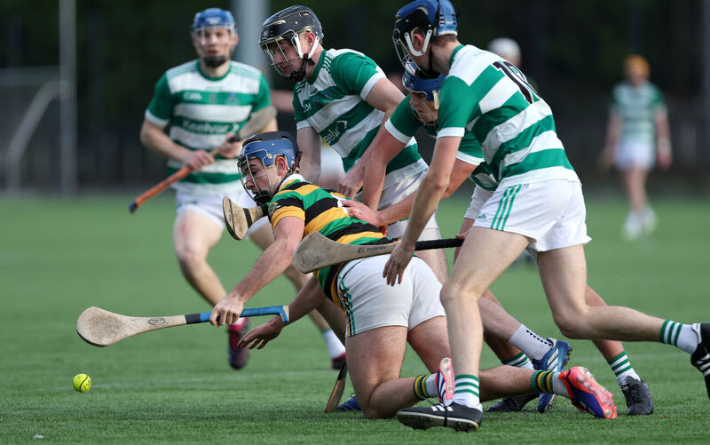 Jake Brosnan, Glen Rovers, under pressure from Charlie O'Sullivan, Cian Johnson and Donnacha O'Connell, Valley Rovers. Picture: Jim Coughlan.