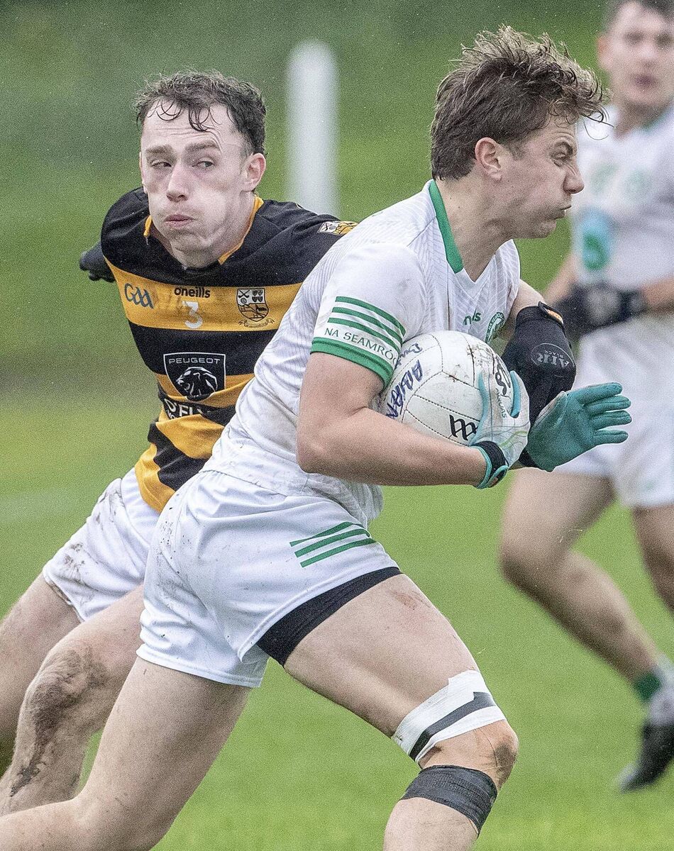 Shamrock's Ivan O’Neill in possession against Buttevant's Kevin Lenahan. Picture: Sean Byrne
