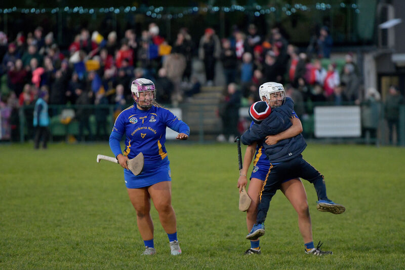 Cara Hurley and Aisling Shannon celebrate with a young supporter after their win over Loughgiel Shamrocks in a nail-biting game. Picture: Moya Nolan Cara Hurley and Aisling Shannon celebrate with a young supporter after their win over Loughgiel Shamrocks in a nail-biting game. Picture: Moya Nolan