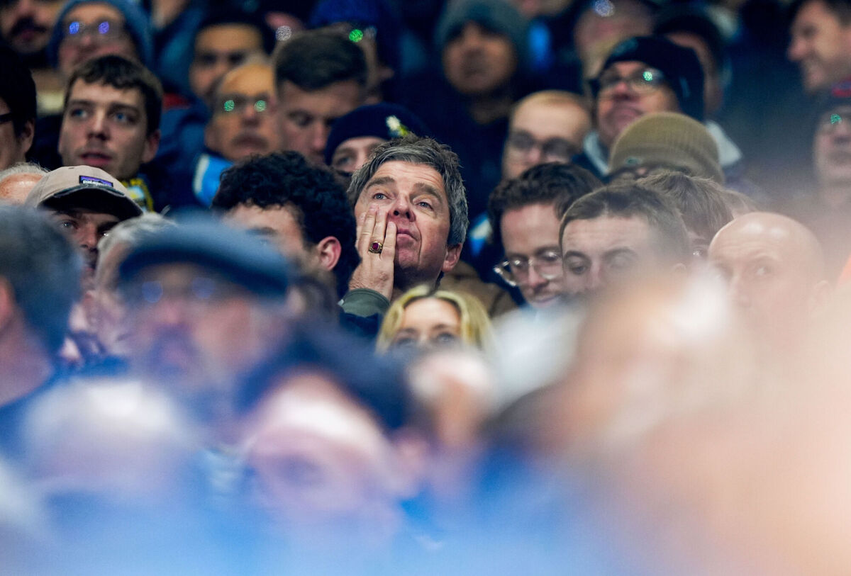 Noel Gallagher shows his concern watching the action against Fulham with the Manchester City fans during the Premier League match at Craven Cottage, London. Picture: Bradley Collyer/PA Wire