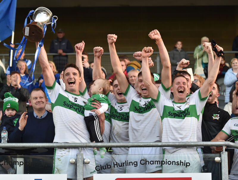 Kanturk captain Aidan Walsh with his son Macdara raises the Billy Long Cup after defeating Bantry Blues in the Cork PIFC final in 2022. Picture: Eddie O'Hare Kanturk captain Aidan Walsh with his son Macdara raises the Billy Long Cup after defeating Bantry Blues in the Cork PIFC final in 2022. Picture: Eddie O'Hare