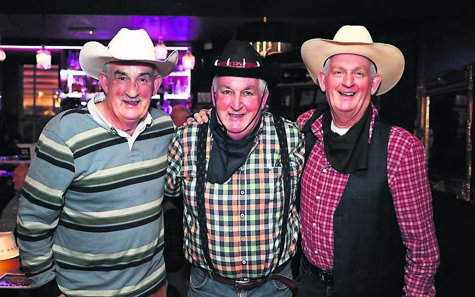 Micheál (centre) with his brothers Kieran (left), of Ballinora, and Bernard, of Kinsale, at the launch of his CD in the Courtmacsherry Hotel , West Cork Picture: Martin Walsh Micheál (centre) with his brothers Kieran (left), of Ballinora, and Bernard, of Kinsale, at the launch of his CD in the Courtmacsherry Hotel , West Cork Picture: Martin Walsh
