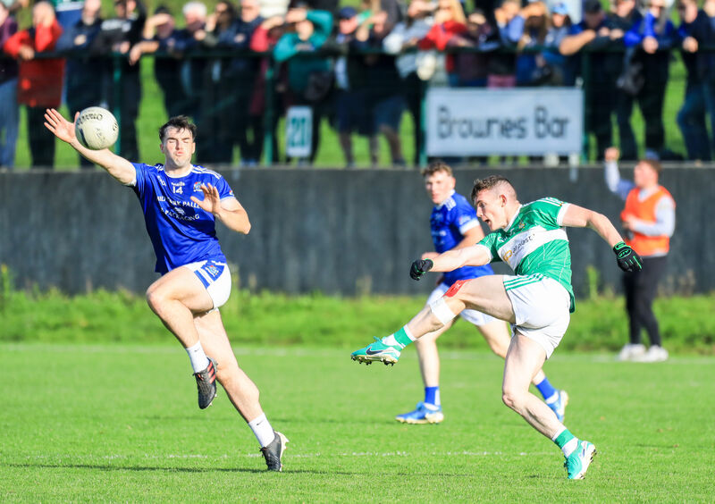 Naomh Abán's Darragh O'Leary tries to block a shot from Aghabullogue's Matthew Bradley this year. Picture: David Creedon Naomh Abán's Darragh O'Leary tries to block a shot from Aghabullogue's Matthew Bradley this year. Picture: David Creedon