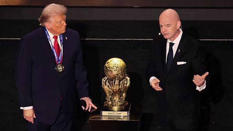 Donald Trump awarded inaugural FIFA peace prize at World Cup draw