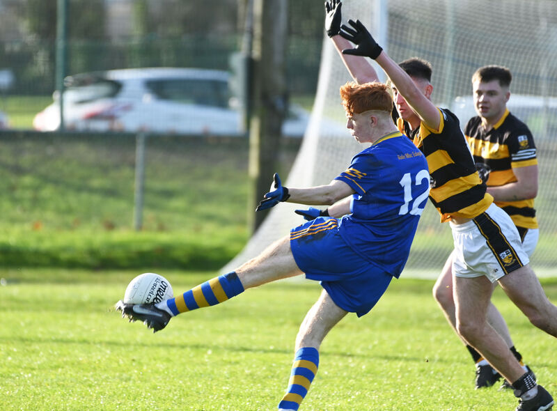 Ballymacelligott's Jack Joy shoots from Buttevant's Aaron Trimm. Picture: Eddie O'Hare Ballymacelligott's Jack Joy shoots from Buttevant's Aaron Trimm. Picture: Eddie O'Hare