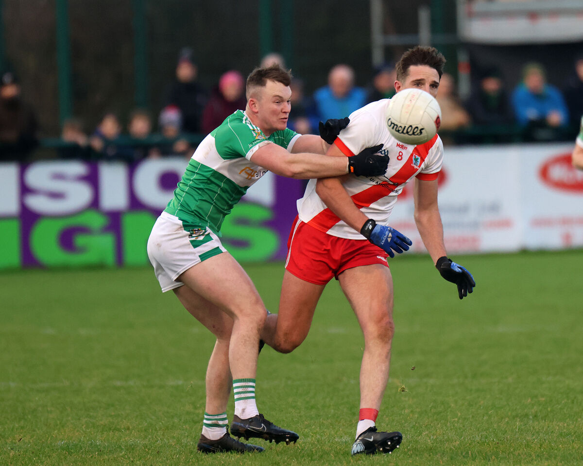 Aidan Walsh in possession of the ball against Shane Tarrant. Picture: Brendan Gleeson Aidan Walsh in possession of the ball against Shane Tarrant. Picture: Brendan Gleeson