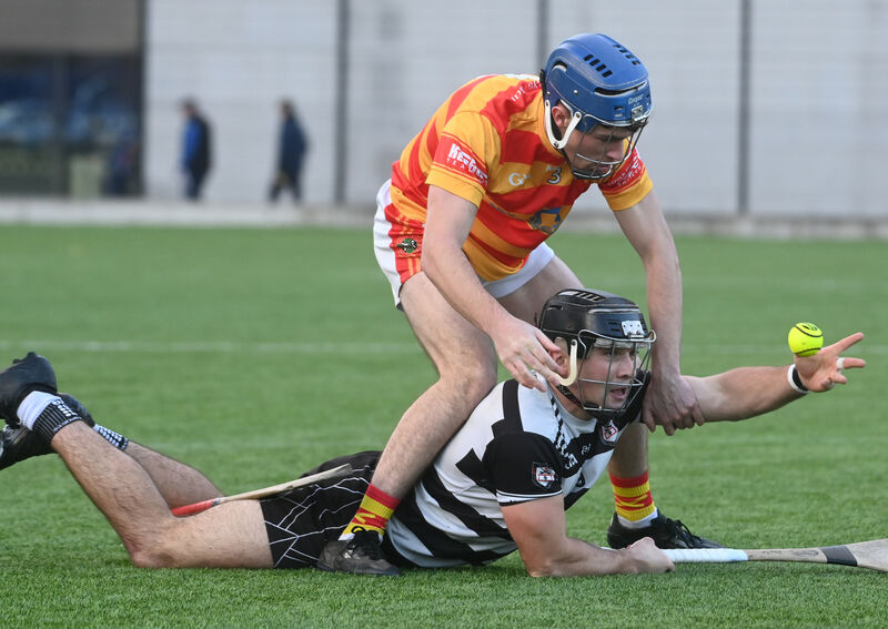 Mikey Finn tries to retain possession for Midleton against Newcestown. Picture: Larry Cummins Mikey Finn tries to retain possession for Midleton against Newcestown. Picture: Larry Cummins