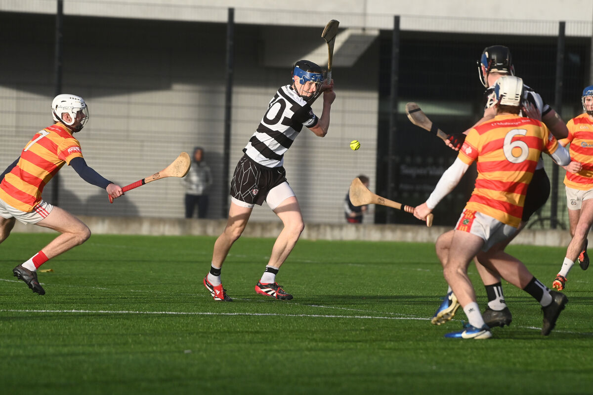 Cathal Beausang fires over a point for Midleton against Newcestown. Picture: Larry Cummins