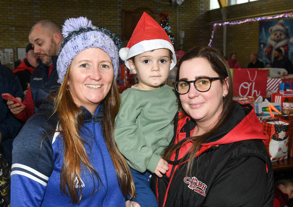Bernadette Rowe, Cory O'Donovan and Eimear Hastings, attending the annual collection of Christmas gifts for less fortunate children at Cobh GAA club. Bernadette Rowe, Cory O'Donovan and Eimear Hastings, attending the annual collection of Christmas gifts for less fortunate children at Cobh GAA club.