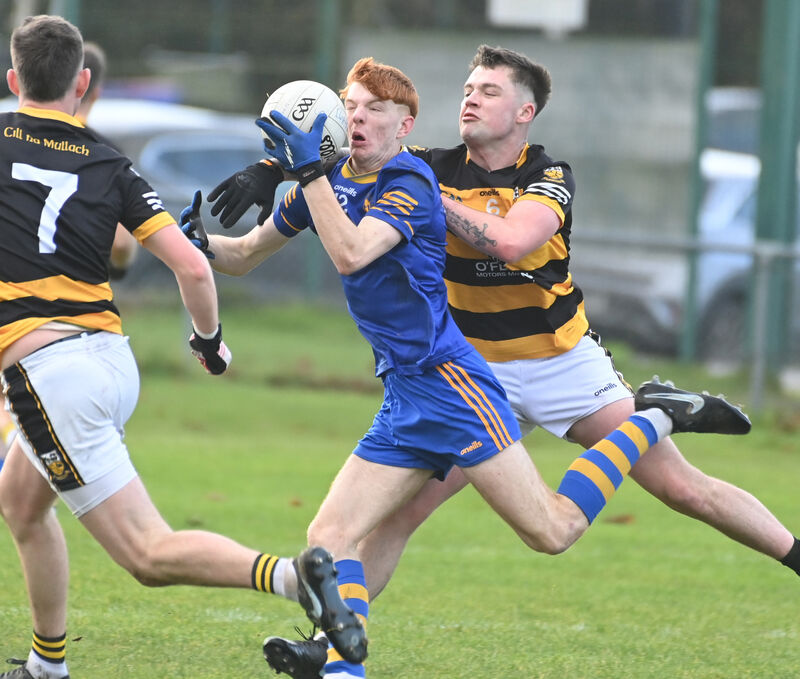 Ballymacelligott's Jack Joy is tackled by Buttevant's Kyle Bowles. Picture: Eddie O'Hare